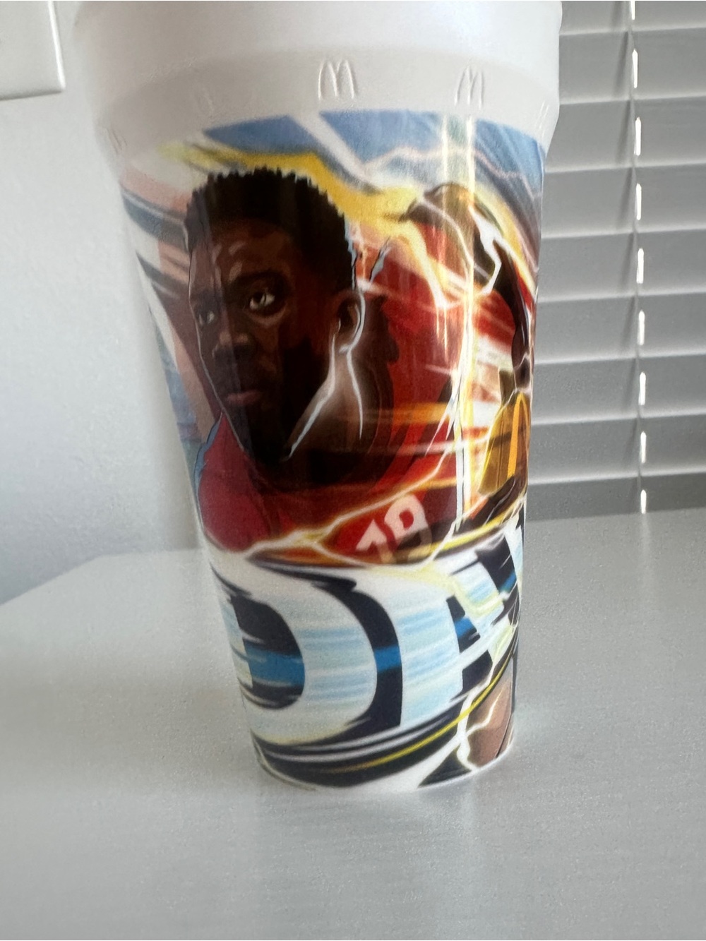 McDonald's 2026 FIFA World Cup collectible cup featuring Alphonso Davies